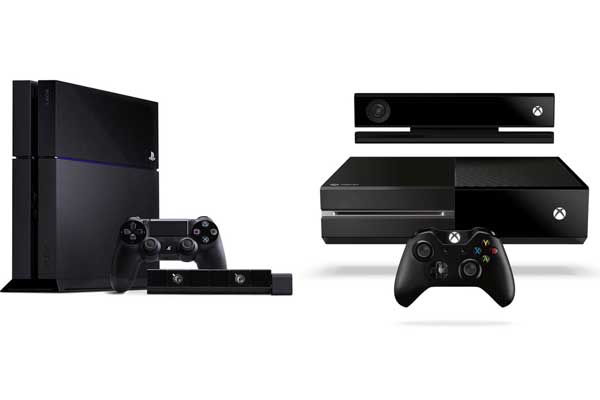 Sony'S PlayStation 4 (PS4, LEFT) next to Microsoft's Xbox One (right).