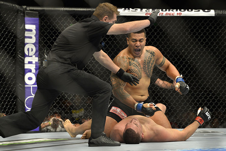 KO king ... Soa Palelei knocks out Pat Barry in their UFC heavyweight bout in Brisbane.