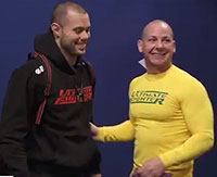 Team Australia trainer Jon Chaimberg (right) with his regular student, Team Canada's Chad Laprise.