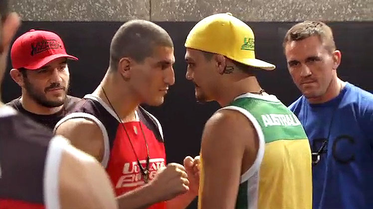 The stage is set ... Team Canada's Nordine Taleb and Team Australia's Tyler Manawaroa face off as coaches Patrick Cote (left) and Kyle Noke (right) look on.