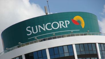 Suncorp has increased its dividend despite a fall in profit.