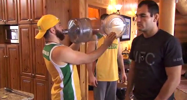 Brendan O'Reilly proudly shouts into his water bottle horn. Zein Saliba (right) is not impressed.