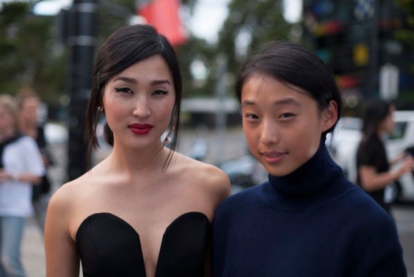 Bloggers Nicole Warne and Margaret Zhang pose outside VAMFF. Photo: Sarah Kinsella