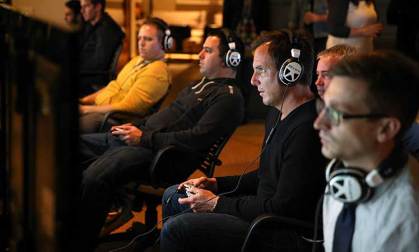 Actor Will Arnett tests out the multiplayer action.
