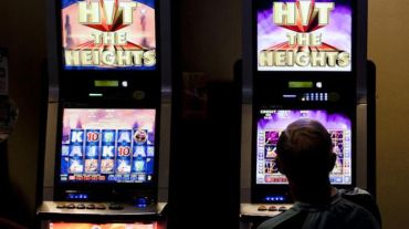 Anglicare wants access to pokies restricted after 10pm.