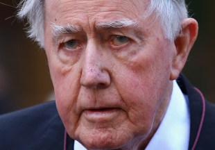 Wran arrives at the memorial service for Margaret Whitlam in 2012.