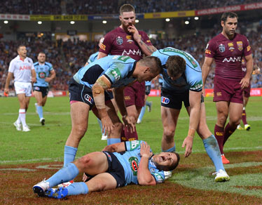... agony. But he came back to make a match-saving tackle. Photos: Getty