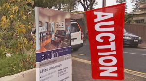 Auction flag outside a property for sale