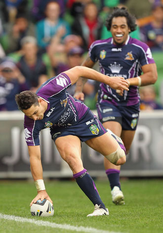 Billy Slater became the third most prolific try scorer in history. Photo: Getty