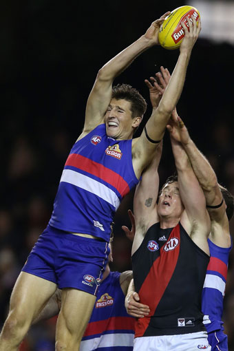 Marcus Bontempelli outpointed Carlisle in this aerial duel. Photo: Getty