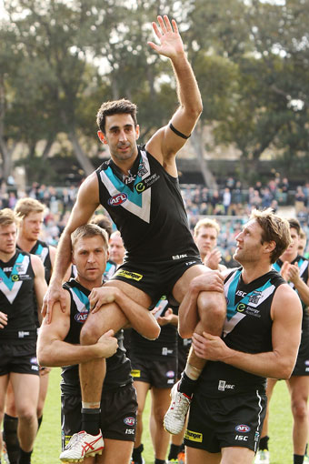Domenic Cassisi is carried off after his retirement game for Port Adelaide. Photo: Getty