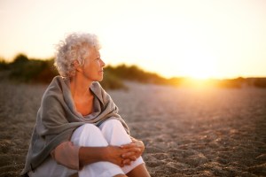 elderly woman on beach