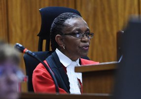 Judge Thokozile Masipa reads her verdict. 