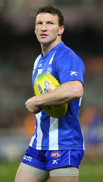 Brent Harvey faces a nervous wait while his clash with Joel Selwood is assessed. Photo: Getty