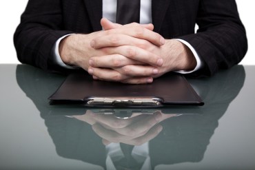 businessman at desk money