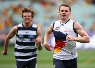Patrick Dangerfield wins the 2013 grand final sprint. Photo: Getty