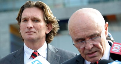James Hird (L) outside court with Essendon chairman Paul Little.