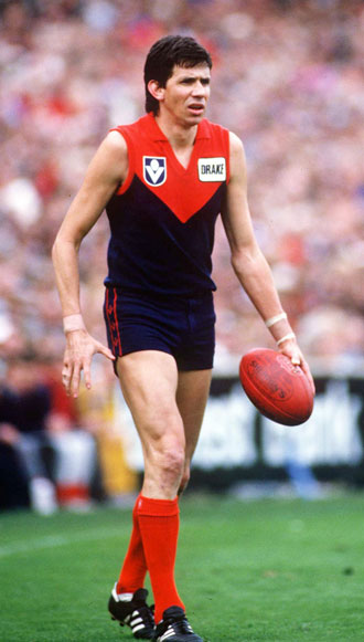 Robbie Flower in the traditional Melbourne red and blue. Photo: Getty