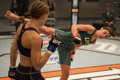 Alex Chambers launches a head kick. Photo: Getty