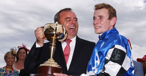 Andreas Wohler (L) and jockey Ryan Moore.
