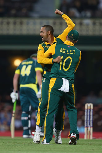 That's eight! Robin Peterson celebrates the demise of Pat Cummins. Photo: Getty