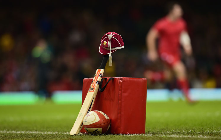 In Cardiff, Wales, a cricket bat and a Welsh cap are laid out in memory of Hughes before the match against South Africa. Photo: Getty