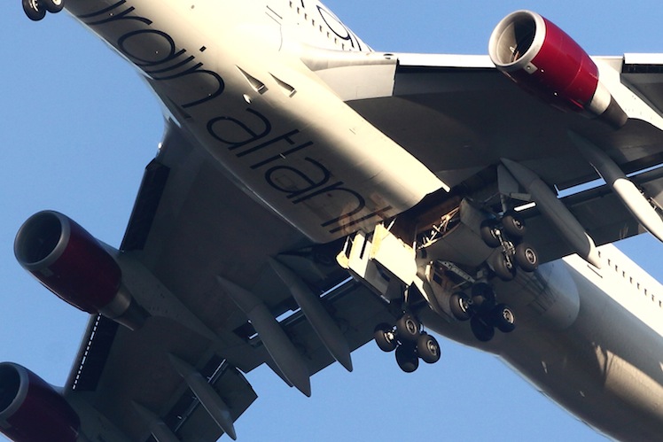 A bottom view of the Boeing, showing the partially jammed landing gear. Photo: Getty