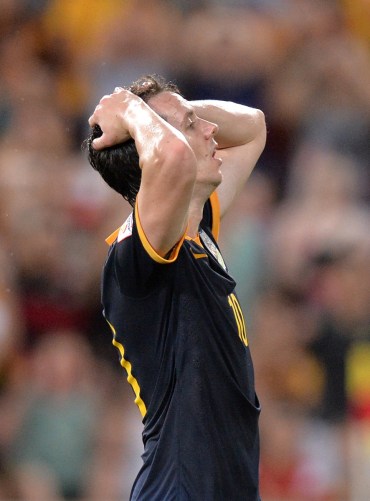 Robbie Kruse rues a missed opportunity to equalise against South Korea. Replays suggest the pitch forced the ball to bobble, hindering his effort. Photo: Getty.