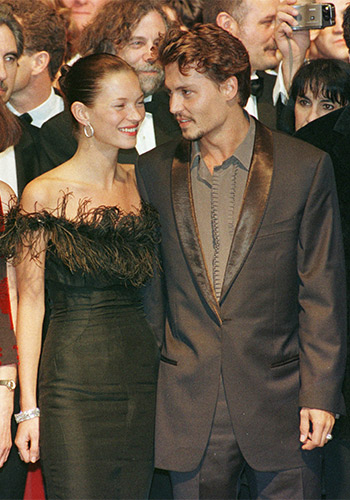 Super cool: With then partner Kate Moss at the premiere of Fear and Loathing in Las Vegas at Cannes in 1998. Photo: AAP