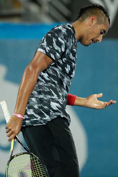 Nick Kyrgios was clearly hampered during his loss to Jerzy Janowicz. Photo: Getty
