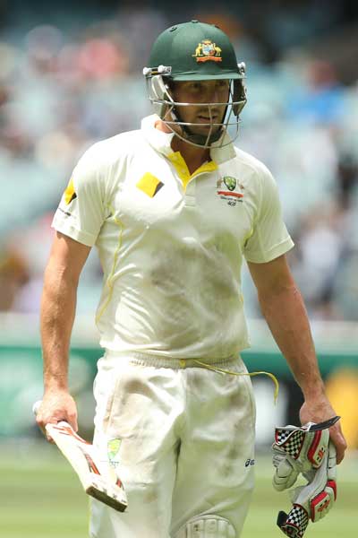 Marsh walks off after being run out for 99 in the Boxing Day Test. Photo: Getty