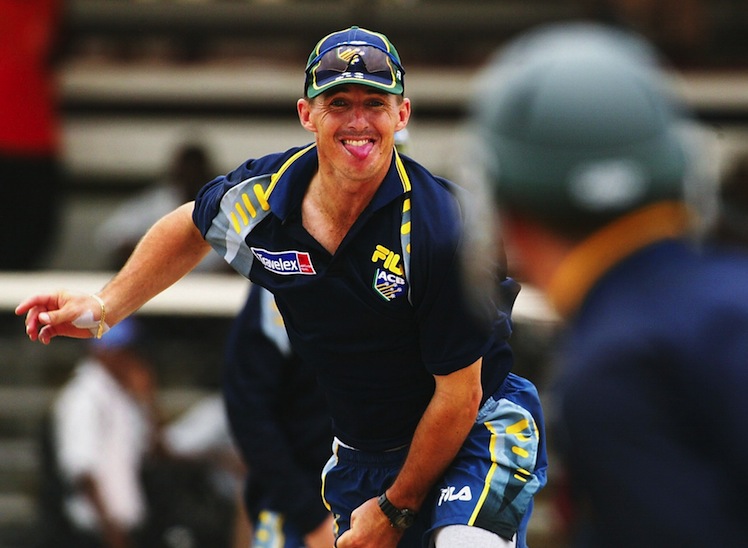 Brad Hogg of Australia bowls
