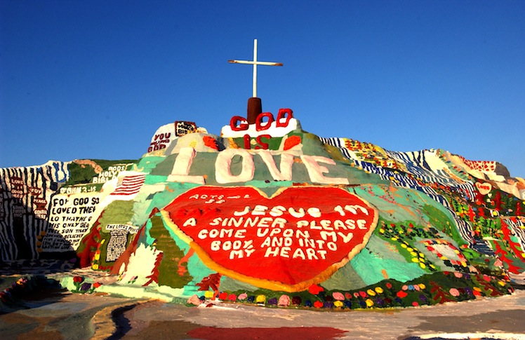 The state once tried to declare Salvation Mountain a hazardous waste site and have it destroyed – now it attracts the attention of journalists and folk art lovers worldwide. Photo Getty