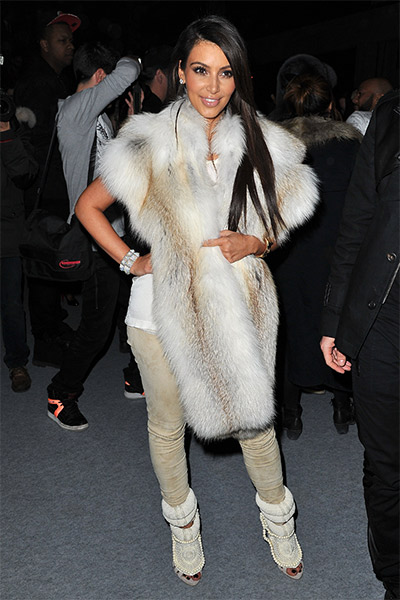 West's 2012 fashion show: Kim Kardashian arrives on the scene. We think she's either trying to be a model or auditioning to be an extra in Star Wars. Either way, things are getting real for West. Photo: Getty
