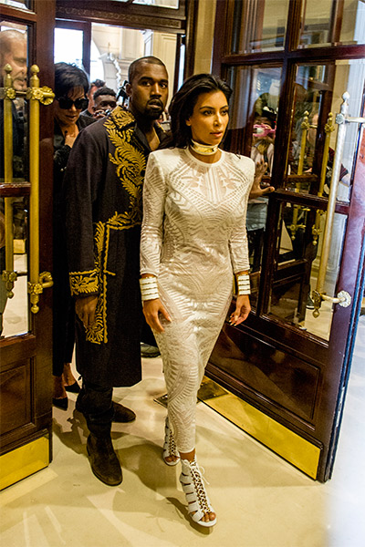 The couple arriving at the Balmain Spring/Summer 2015 ready-to-wear fashion collection, in Paris, France, 2014. Photo: AAP