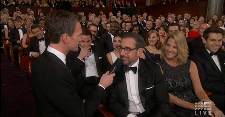 Harris chats with Steve Carrell during one of his off-stage skits. See Channing Tatum's face behind Carrell to see who it went down.