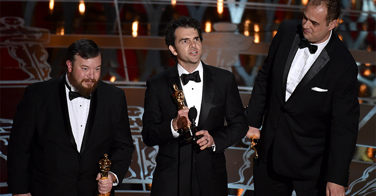 Thomas Curley, from left, Craig Mann and Ben Wilkins accept the award for best sound mixing for Whiplash.