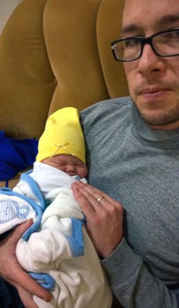 Sam Forrest with baby Leo. Photo: ABC