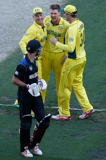 Brad Haddin and James Faulkner let Grant Elliott know all about it. Photo: Getty