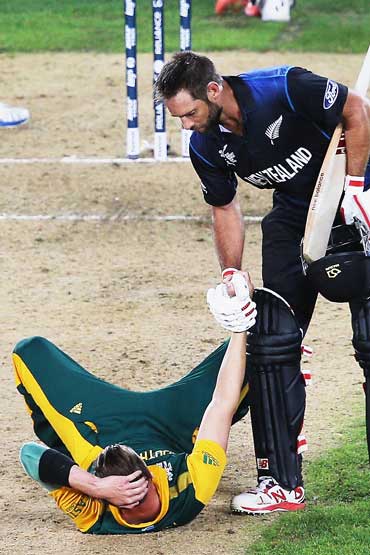 Good sport: Grant Elliott and Dale Steyn after the war was won.
