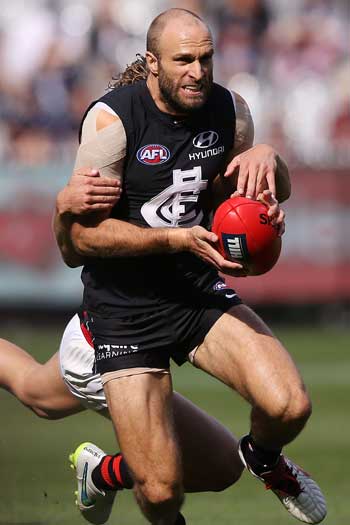 Carlton champion Chris Judd was confronted by an agitated man wearing an Essendon jumper. Photo: Getty