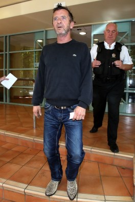 AC/DC drummer Phil Rudd leaves Tauranga District Court in December 2014. Photo: Getty