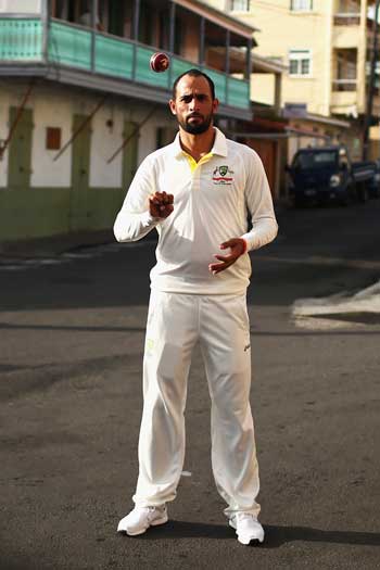 Fawad Ahmed adds to the canon of awkward portraits, on the streets of Dominica. Photo: Getty