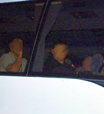 A group of detainees being transferred from the Maribyrnong centre in Melbourne.
