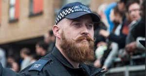 London's hirsute bobby Peter Swinger says he loves motorbikes and meatloaf.