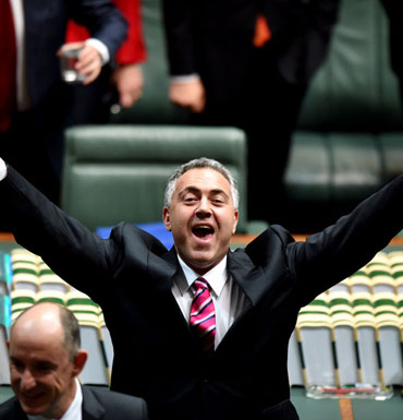 Treasurer Joe Hockey celebrates the end of the speech.