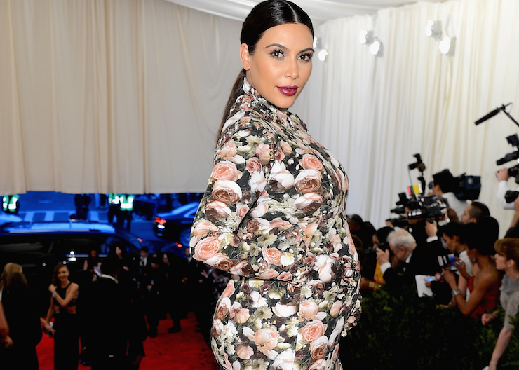 Kim Kardashian pregnant and dressed in her  drapes in 2013.