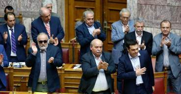 Greek government ministers applauded the referendum vote. Photo: AAP