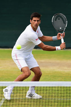 Djokovic warms up for Wimbledon on the practice courts. Photo: Getty