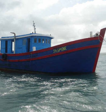 The Jasmine, which Indonesian police say was given to people smugglers by Australian authorities before running aground on a reef